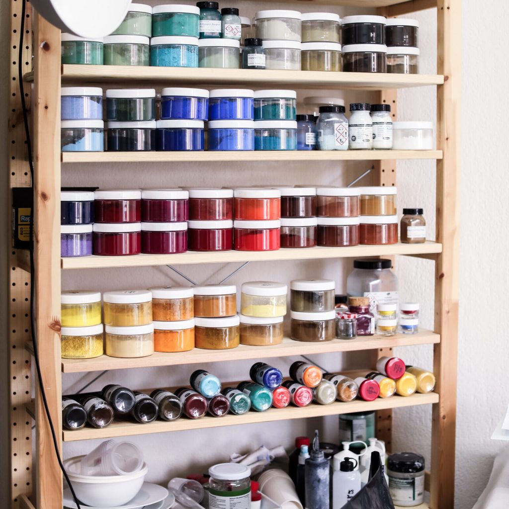 image of pigments on shelf with supplies